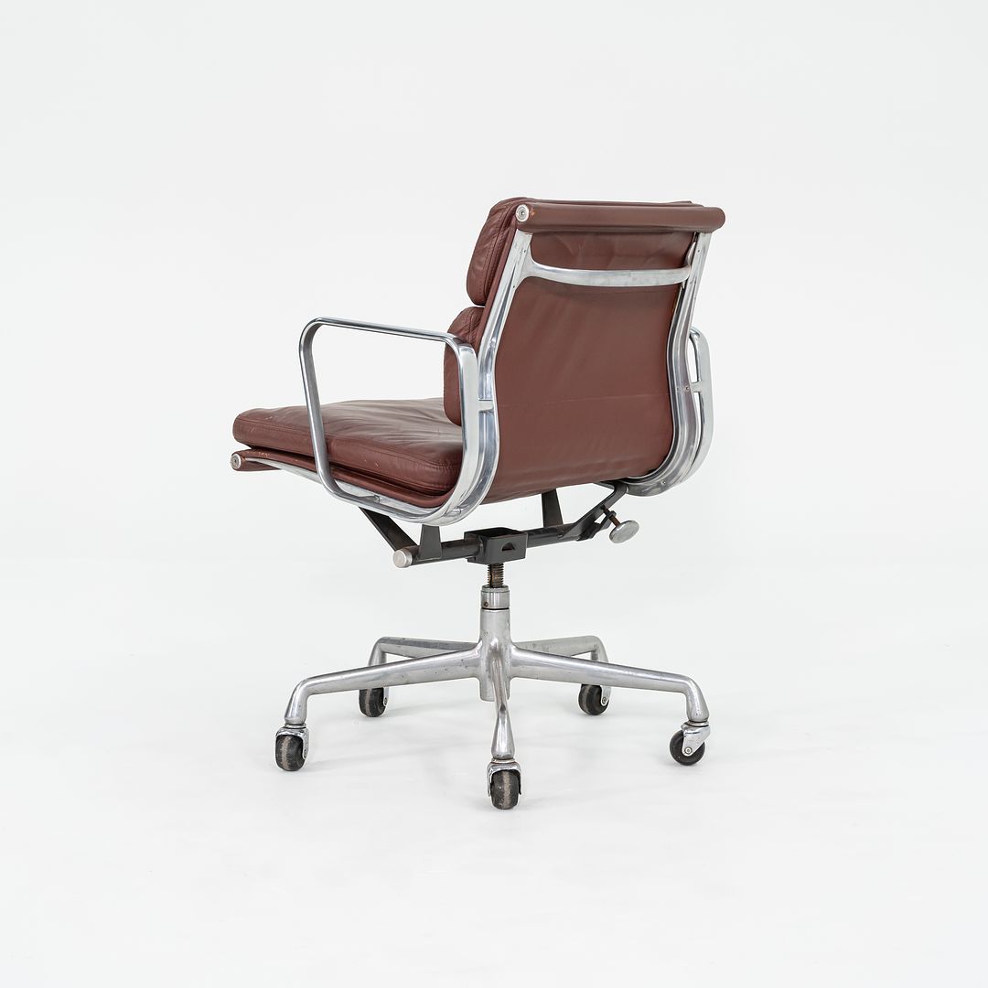 SOLD 1987 Soft Pad Management Chair, EA435 by Ray and Charles Eames for Herman Miller in Red/Brown Leather 2x Available