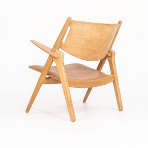 1960s CH28P Lounge Chair by Hans Wegner for Carl Hansen & Søn in Oak with Tan Leather Upholstery