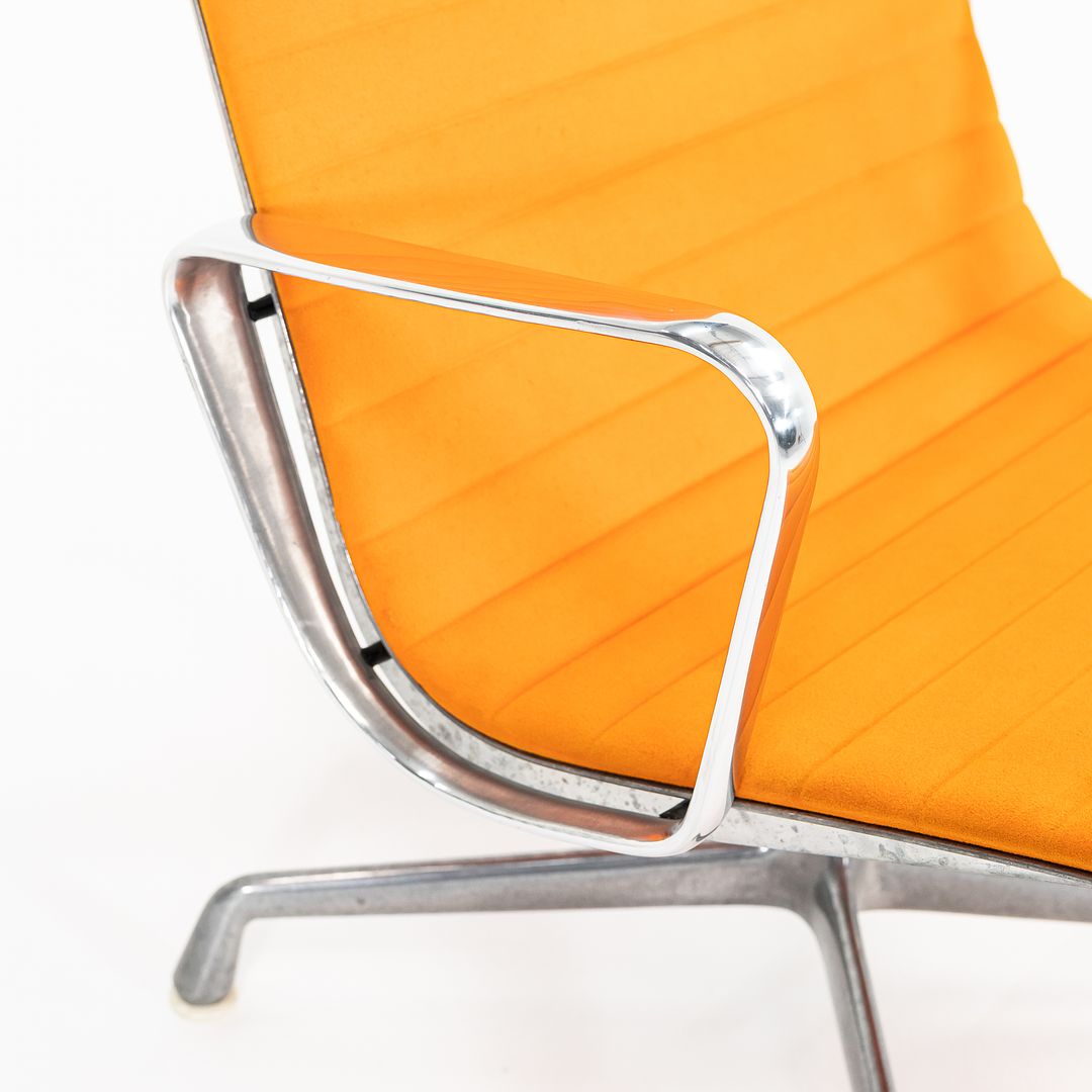 SOLD 1970s Eames Aluminum Group Lounge Chair, model EA124 by Ray and Charles Eames for Herman Miller in Orange Alexander Girard-Designed Hopsack Fabric