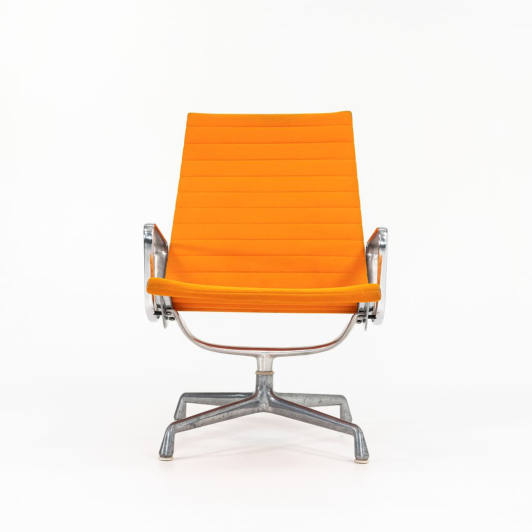 SOLD 1970s Eames Aluminum Group Lounge Chair, model EA124 by Ray and Charles Eames for Herman Miller in Orange Alexander Girard-Designed Hopsack Fabric