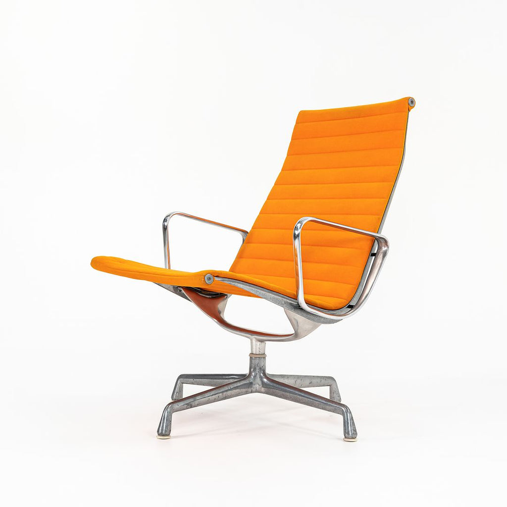 SOLD 1970s Eames Aluminum Group Lounge Chair, model EA124 by Ray and Charles Eames for Herman Miller in Orange Alexander Girard-Designed Hopsack Fabric