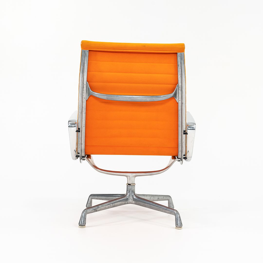 SOLD 1970s Eames Aluminum Group Lounge Chair, model EA124 by Ray and Charles Eames for Herman Miller in Orange Alexander Girard-Designed Hopsack Fabric