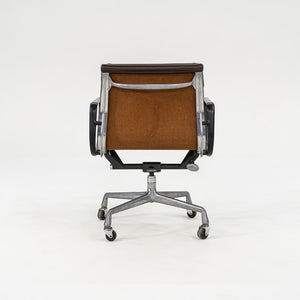 1982 Eames Soft Pad Management Chair, EA418 by Ray and Charles Eames for Herman Miller in Brown Leather 2x Available