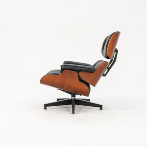 SOLD 1995 Eames 670 & 671 Lounge and Ottoman by Ray and Charles Eames for Herman Miller in Black Leather and Cherry