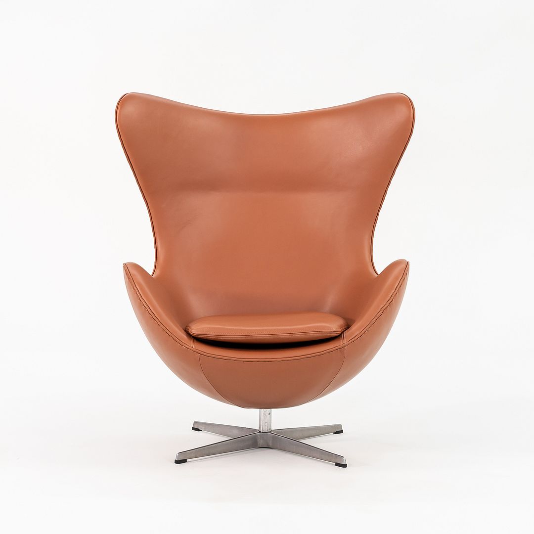 1990s Egg Lounge Chair and Ottoman by Arne Jacobsen for Fritz Hansen in New Cognac Leather