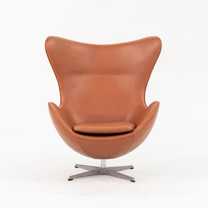 1990s Egg Lounge Chair and Ottoman by Arne Jacobsen for Fritz Hansen in New Cognac Leather