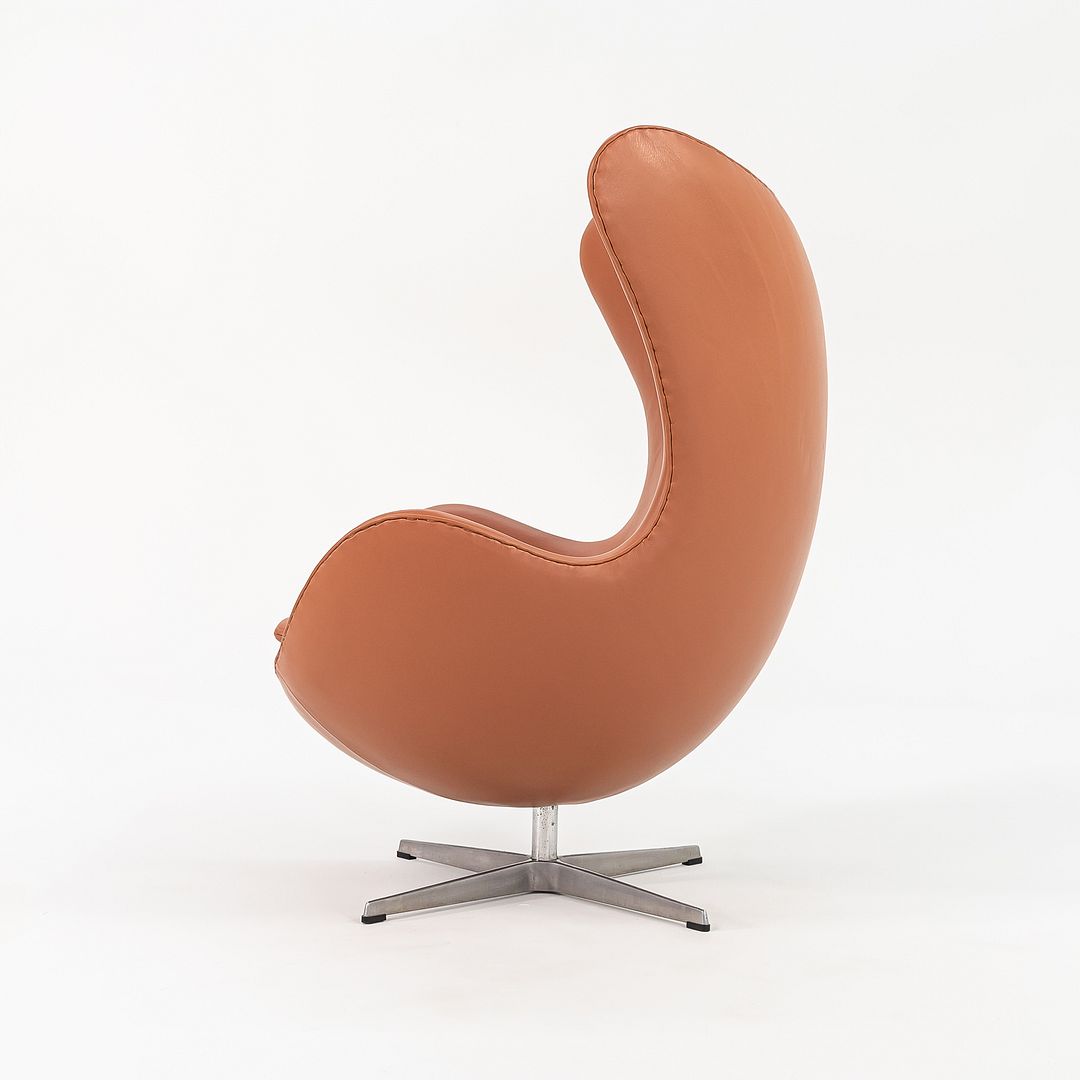 1990s Egg Lounge Chair and Ottoman by Arne Jacobsen for Fritz Hansen in New Cognac Leather