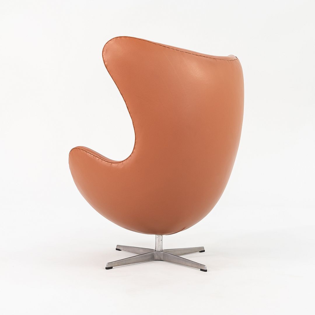 1990s Egg Lounge Chair and Ottoman by Arne Jacobsen for Fritz Hansen in New Cognac Leather