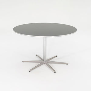 2012 Piet Hein and Arne Jacobsen for Fritz Hansen Super-Circular A825 47 inch Dining Table in Aluminum w/ Black Laminate Top