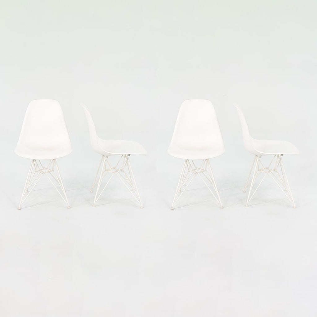 2014 Set of Four Eames Plastic Shell Chairs in White with Eiffel Base