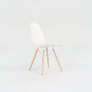 2018 DSW Side Chair with Dowel Base by Ray and Charles Eames for Herman Miller in White Plastic with Oak Base 5x Available