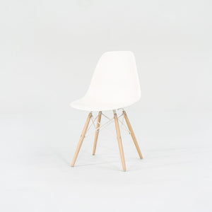 2018 DSW Side Chair with Dowel Base by Ray and Charles Eames for Herman Miller in White Plastic with Oak Base 5x Available