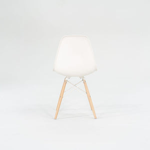 2018 DSW Side Chair with Dowel Base by Ray and Charles Eames for Herman Miller in White Plastic with Oak Base 5x Available