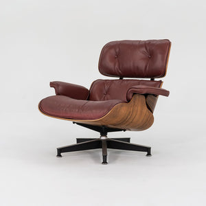 1960s Herman Miller Eames Lounge Chair and Ottoman 670 & 671 by Charles and Ray Eames in Red Leather