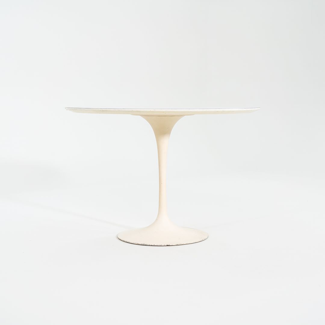 1960s Saarinen Dining Table, Model 173F by Eero Saarinen for Knoll International with Cast Iron Base and 42 inch White Laminate Top