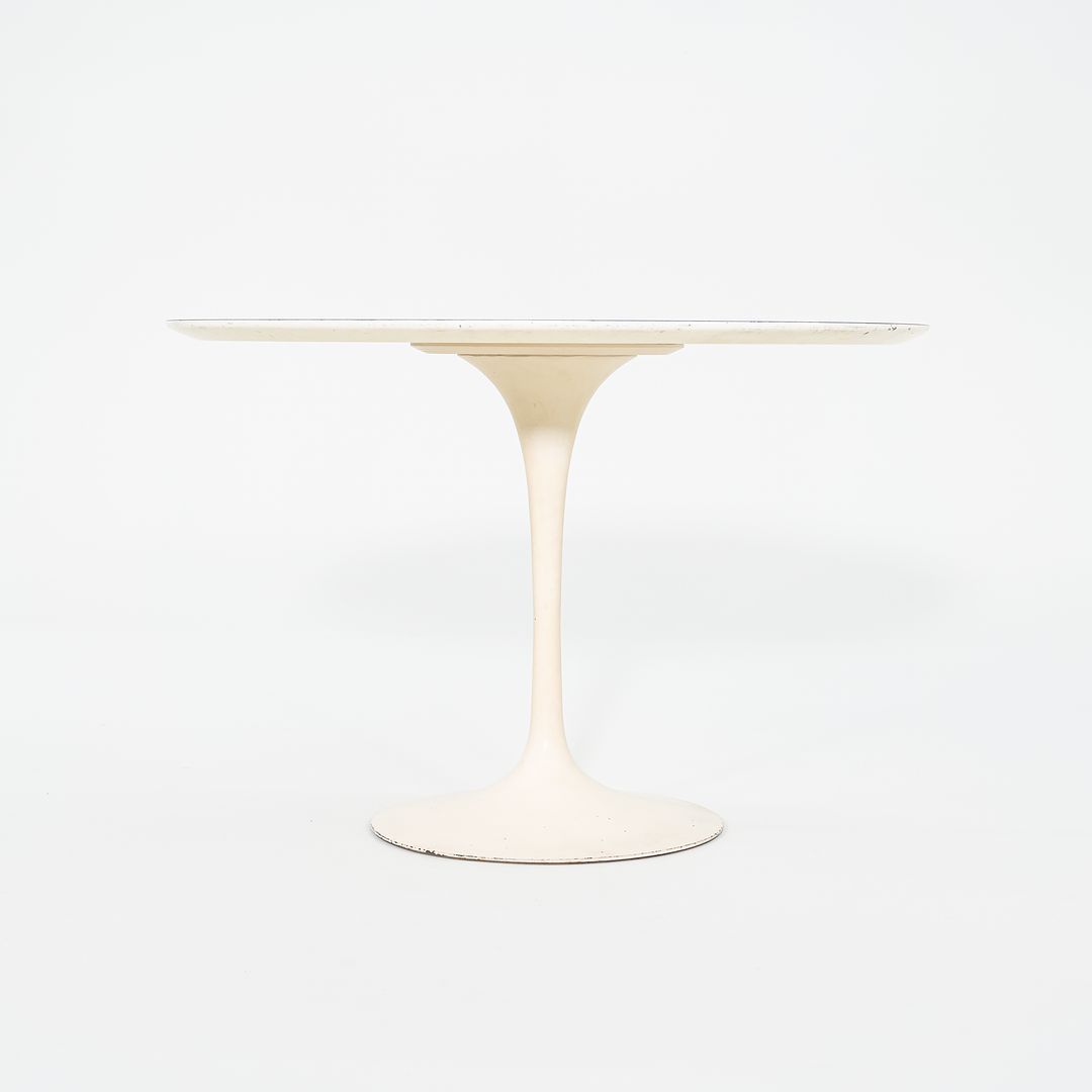 1960s Saarinen Dining Table, Model 173F by Eero Saarinen for Knoll International with Cast Iron Base and 42 inch White Laminate Top