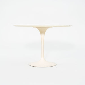 1960s Saarinen Dining Table, Model 173F by Eero Saarinen for Knoll International with Cast Iron Base and 42 inch White Laminate Top