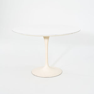 1960s Saarinen Dining Table, Model 173F by Eero Saarinen for Knoll International with Cast Iron Base and 42 inch White Laminate Top