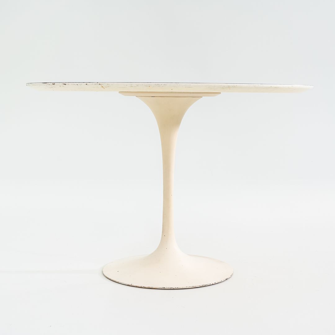 1960s Saarinen Dining Table, Model 173F by Eero Saarinen for Knoll International with Cast Iron Base and 42 inch White Laminate Top