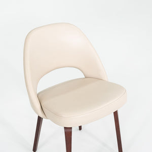 2009 Set of Four Eero Saarinen for Knoll Armless Executive Side Dining Chairs in Cream Leather with Walnut Wood Legs