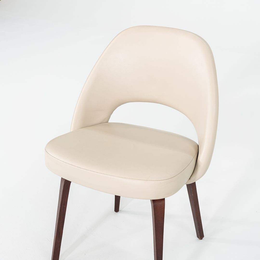 2009 Set of Four Eero Saarinen for Knoll Armless Executive Side Dining Chairs in Cream Leather with Walnut Wood Legs