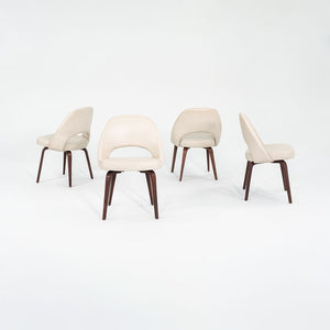 2009 Set of Four Eero Saarinen for Knoll Armless Executive Side Dining Chairs in Cream Leather with Walnut Wood Legs