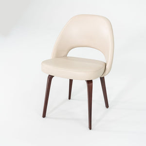 2009 Set of Four Eero Saarinen for Knoll Armless Executive Side Dining Chairs in Cream Leather with Walnut Wood Legs