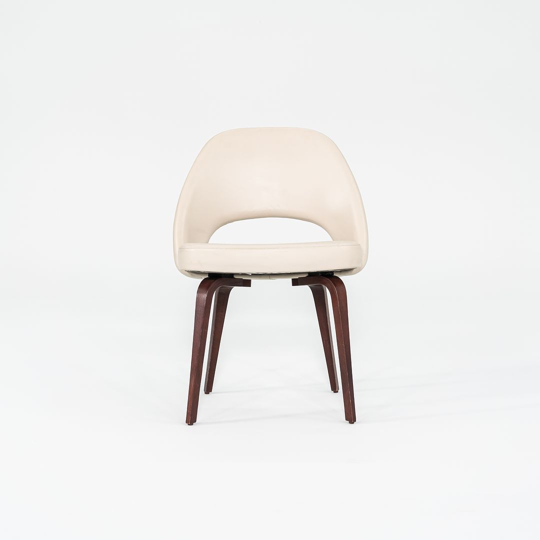 2009 Set of Four Eero Saarinen for Knoll Armless Executive Side Dining Chairs in Cream Leather with Walnut Wood Legs