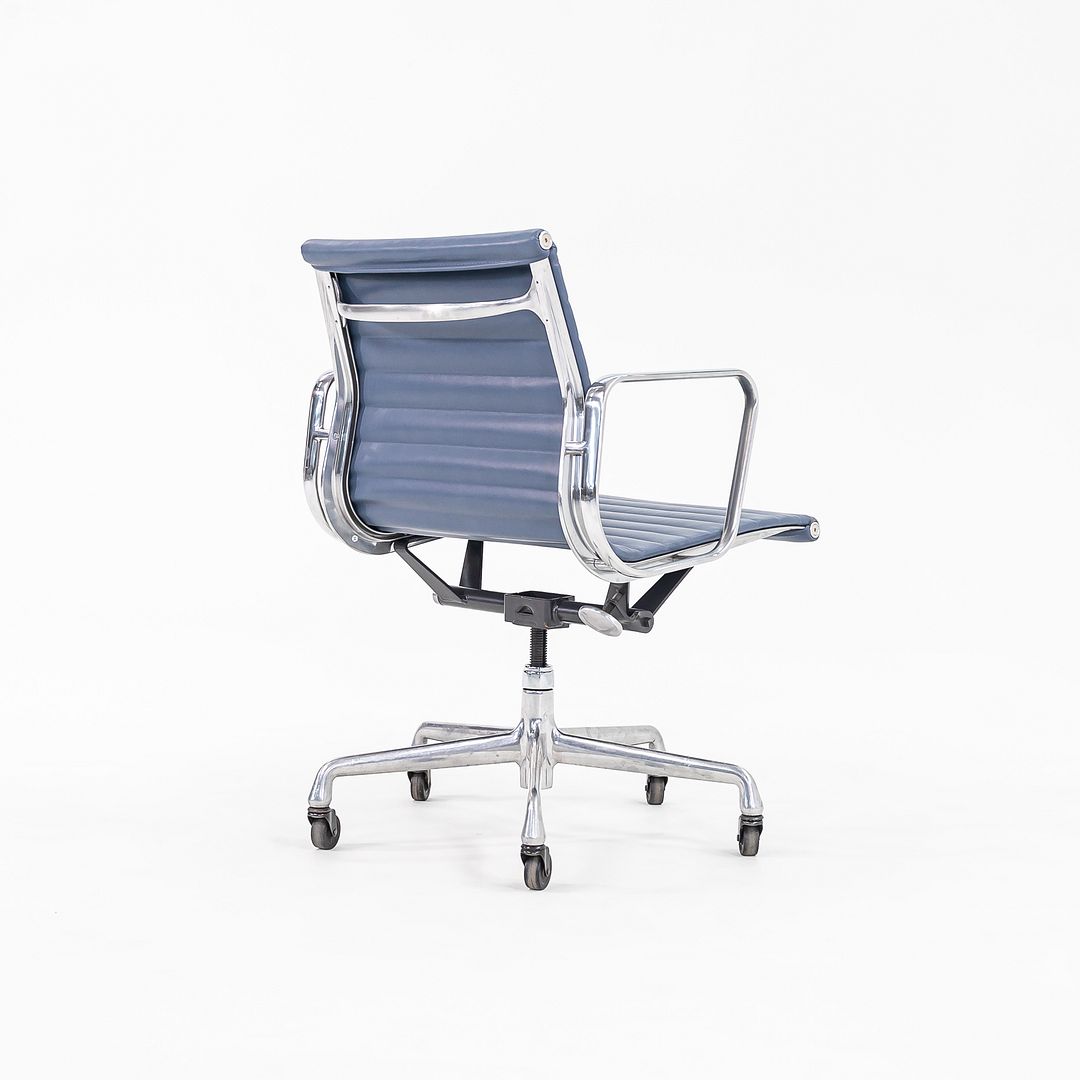 SOLD 2010s Aluminum Group Management Desk Chair, Model EA335 by Charles and Ray Eames for Herman Miller in Blue Leather 2x Available