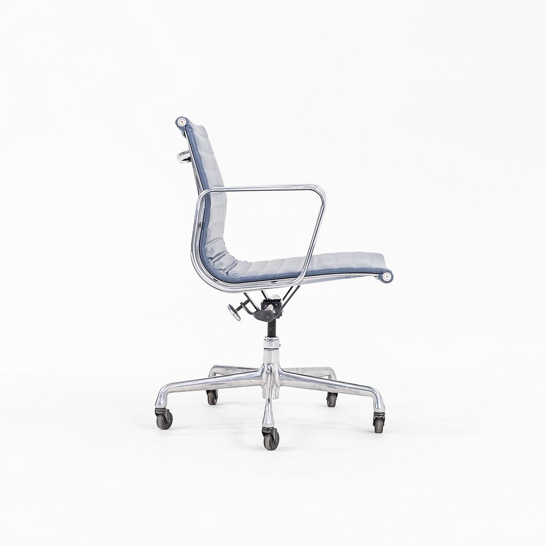 SOLD 2010s Aluminum Group Management Desk Chair, Model EA335 by Charles and Ray Eames for Herman Miller in Blue Leather 2x Available