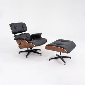 SOLD 2020 Herman Miller Eames Lounge Chair and Ottoman in Black Leather and Walnut