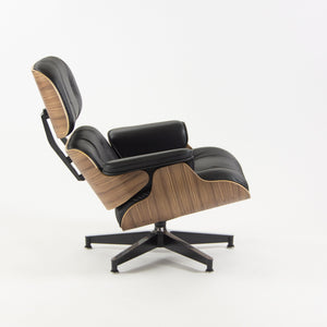 SOLD Herman Miller 2019 Brand New Eames Lounge Chair and Ottoman Walnut Black Leather