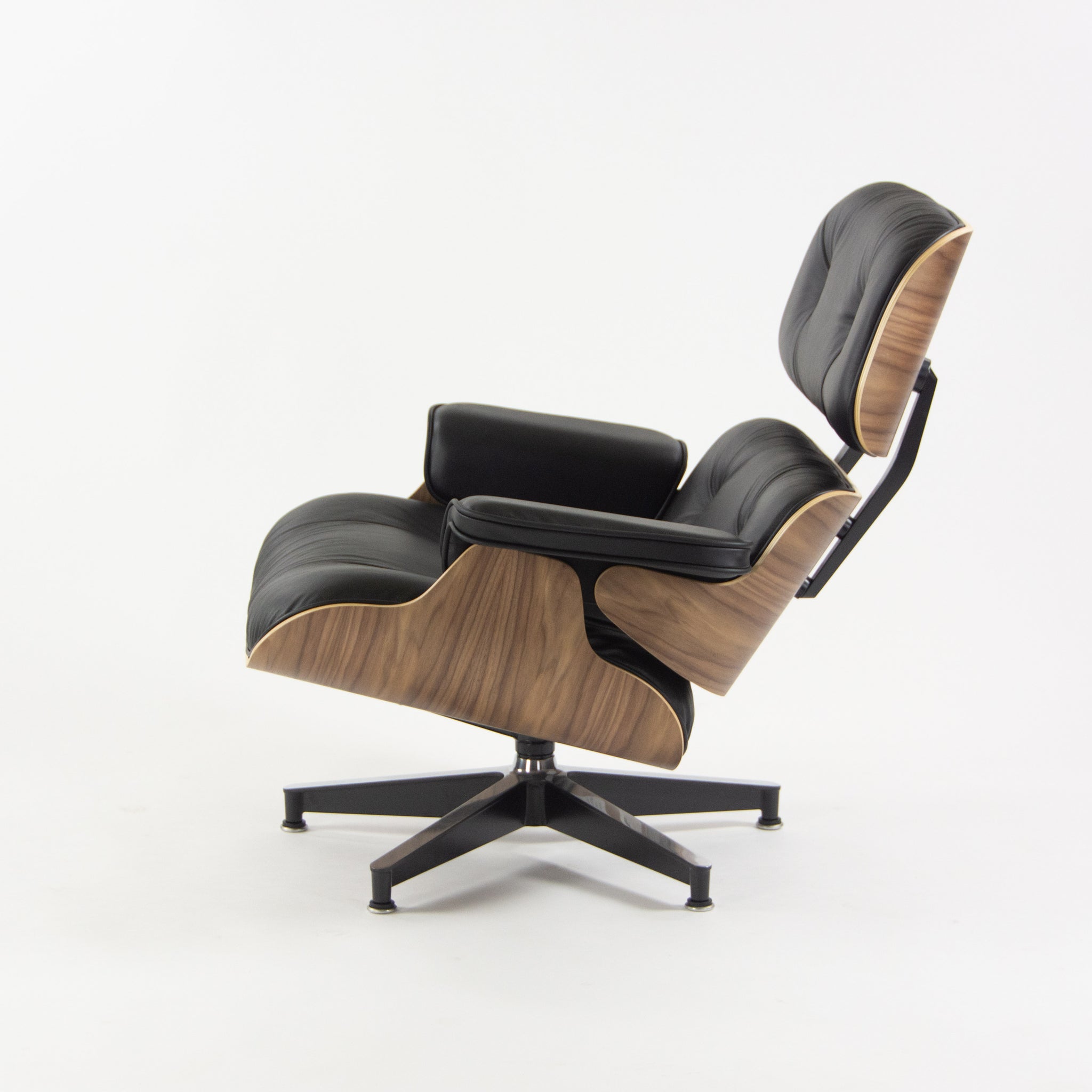 SOLD Herman Miller 2019 Brand New Eames Lounge Chair and Ottoman Walnut Black Leather