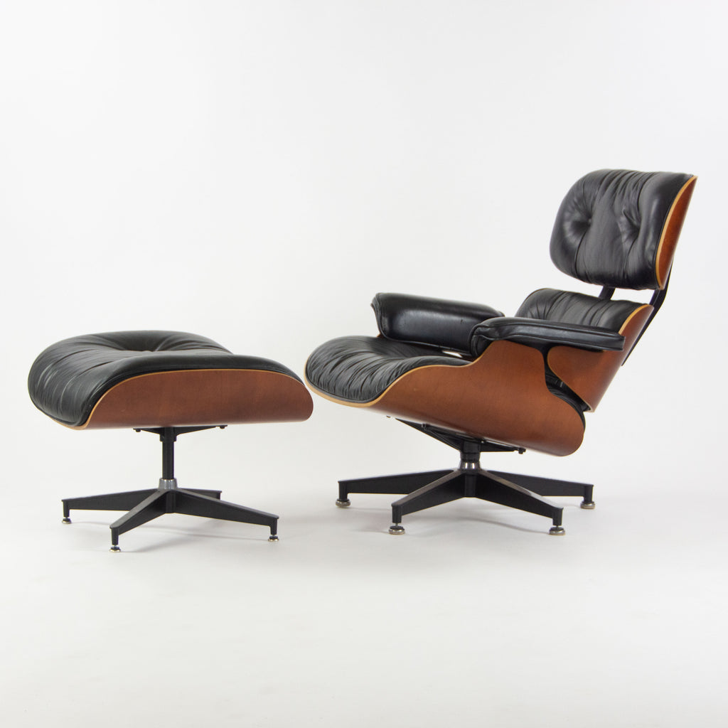 SOLD 1990s Herman Miller Eames Lounge Chair and Ottoman Cherry Black Leather 670 671